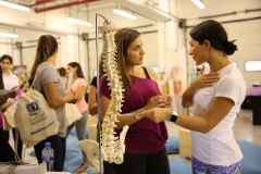 Dr Reem from Chiropractic UAE listening to participants' concerns