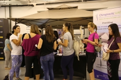 Participants lining up to see the Chiropractic Speaciality Center's booth